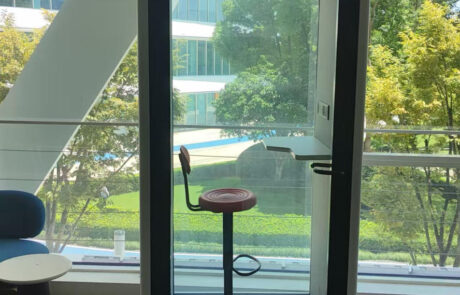 Acoustic Silent Booth | Soundproof Office Phone Pod Acoustic silent booth interior view showing comfortable seating, table and acoustic panels for noise reduction